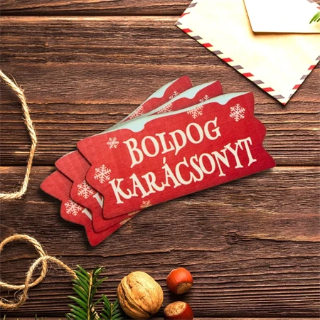 Dekorációs tábla, ajándékkísérő, 3db nyomatott karton tábla 2mm-es, 7,5x3,5cm Boldog Karácsonyt felirat szalag