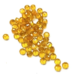 Gyöngy üveg csiszolt fánk 4x3mm borostyán min.60db