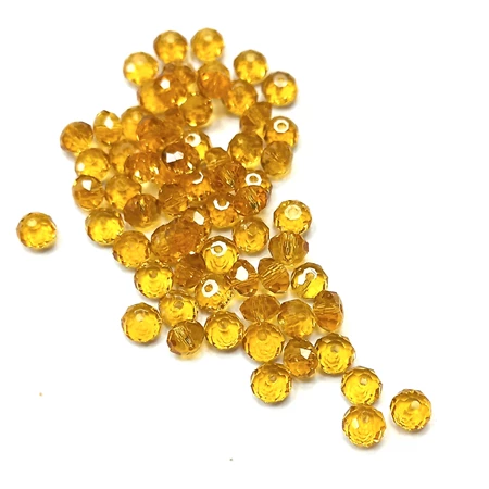 Gyöngy üveg csiszolt fánk 4x3mm borostyán min.60db