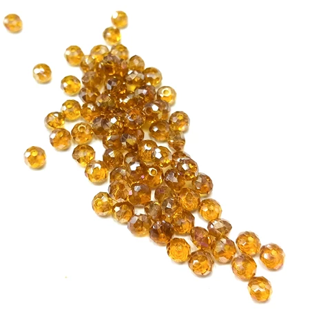 Gyöngy üveg csiszolt fánk 6x4mm borostyán min.40db