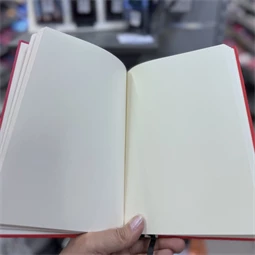 Jegyzetfüzet A/5 sima Faber-Castell 120lapos sima, Chamois krém szinű lapok, Verseny - sárga borítóval