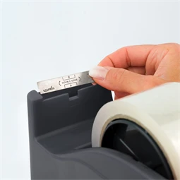 Ragasztószalag-adagoló asztali SAX 729 TAPE-IT-EASY 50mm vagy 2db 19mm-es szalaghoz, szürke, nehezékkel ellátott adagoló