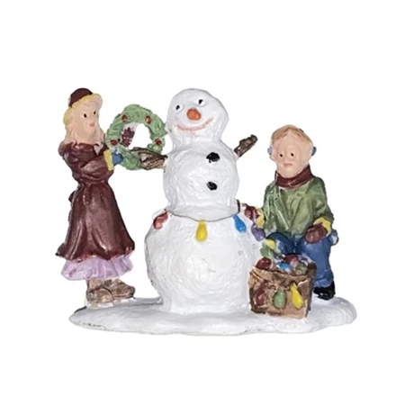 Dekoráció Karácsonyi dekor hóembert építő gyerekek poly 6,2x3,9x4,7cm színes